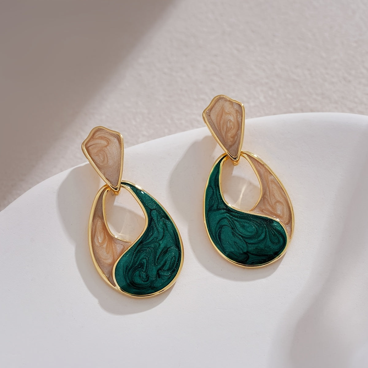 WL Boutique | Elegant Double-Tone Teardrop Earrings with Golden Accents