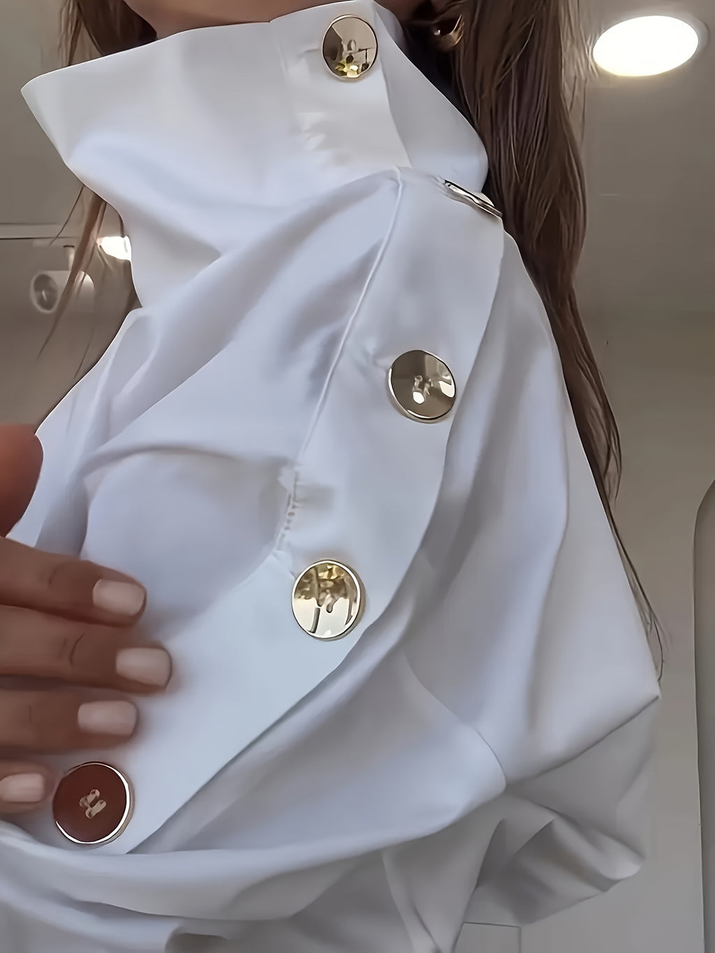 Bruna Aeppli by WL Boutique | Elegant Off-Shoulder High-Neck Blouse with Button Cuffs