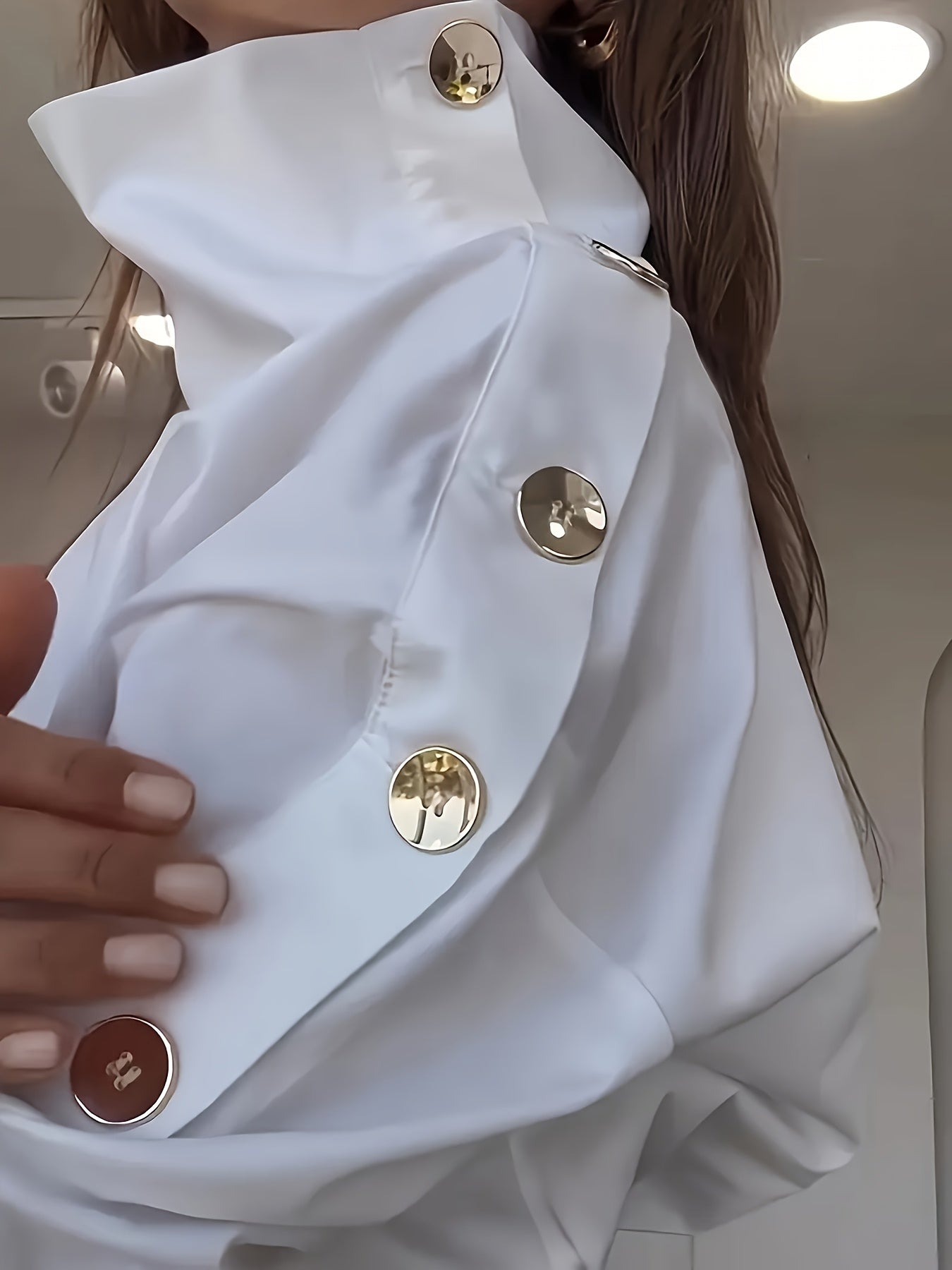 Bruna Aeppli by WL Boutique | Elegant Off-Shoulder High-Neck Blouse with Button Cuffs