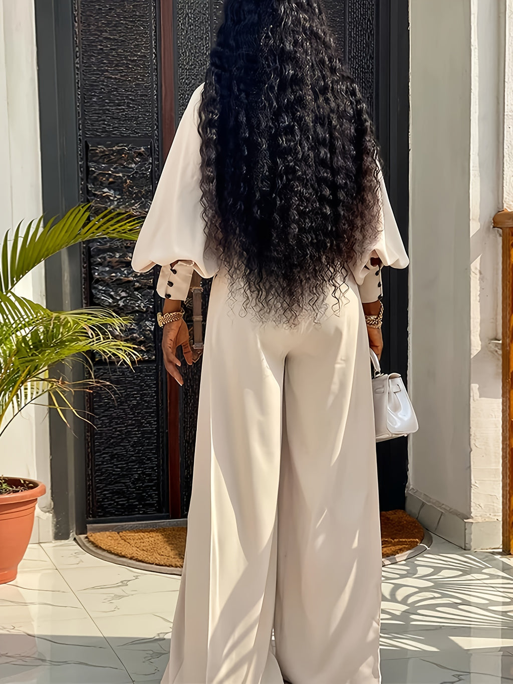 Bruna Aeppli by WL Boutique | Elegant Belted Pantsuit – Timeless Structured Design