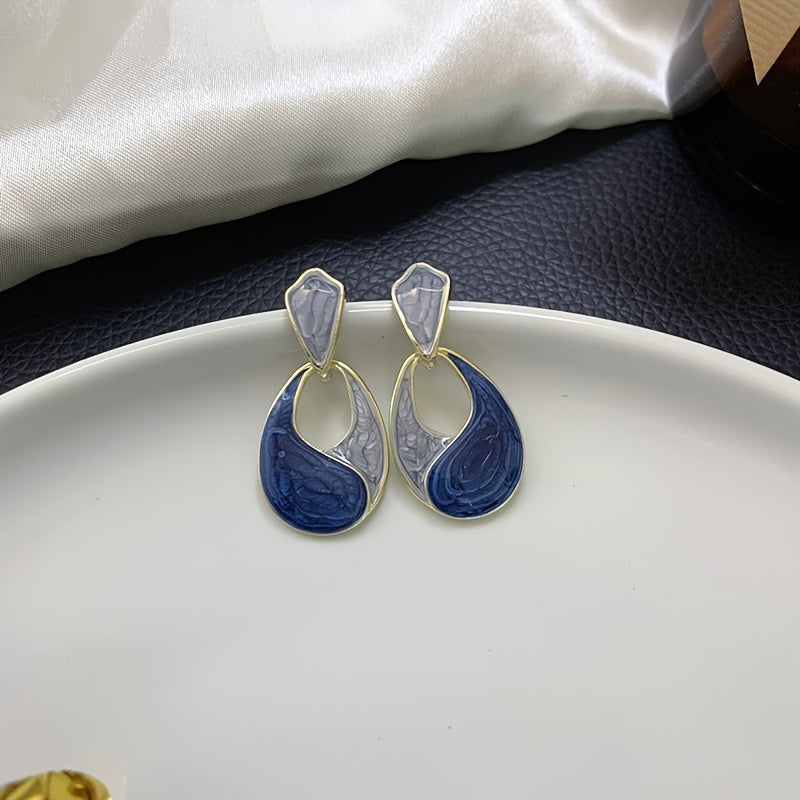 WL Boutique | Elegant Double-Tone Teardrop Earrings with Golden Accents