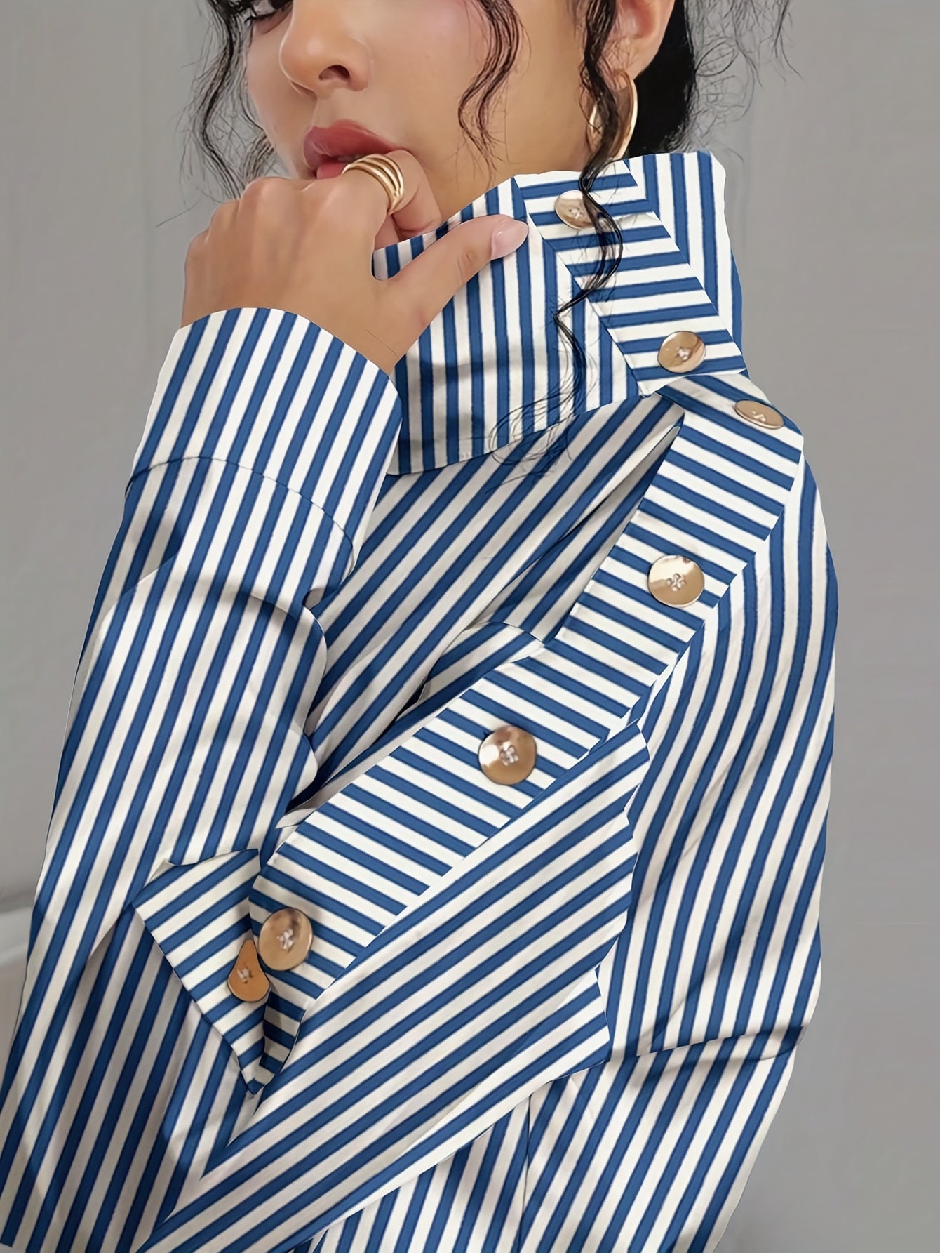 Bruna Aeppli by WL Boutique | Elegant Off-Shoulder High-Neck Blouse with Button Cuffs