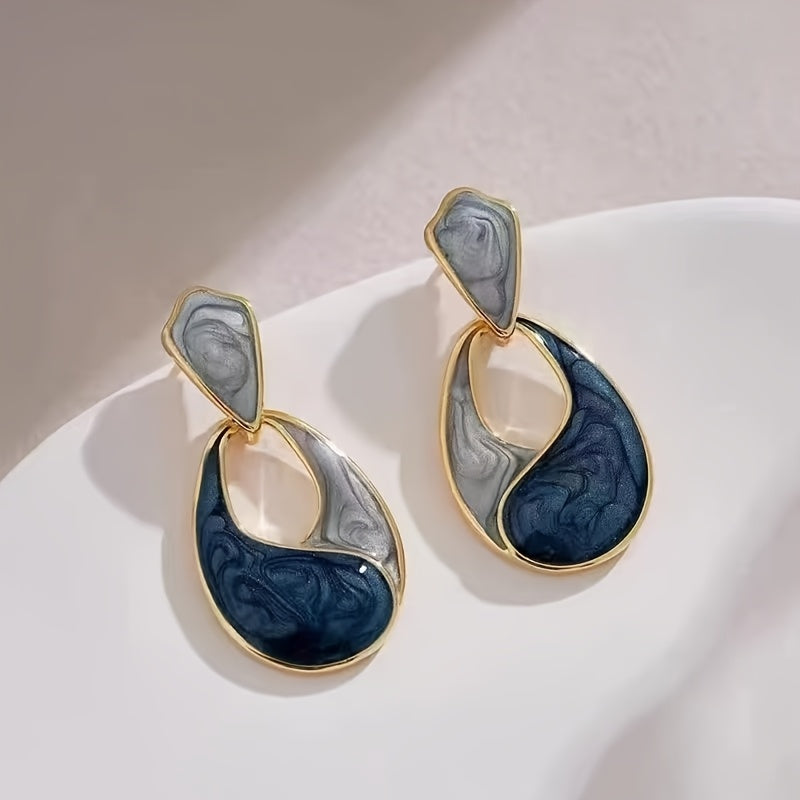 WL Boutique | Elegant Double-Tone Teardrop Earrings with Golden Accents